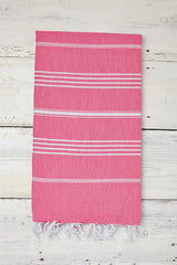 bright pink hammam towel with tassels